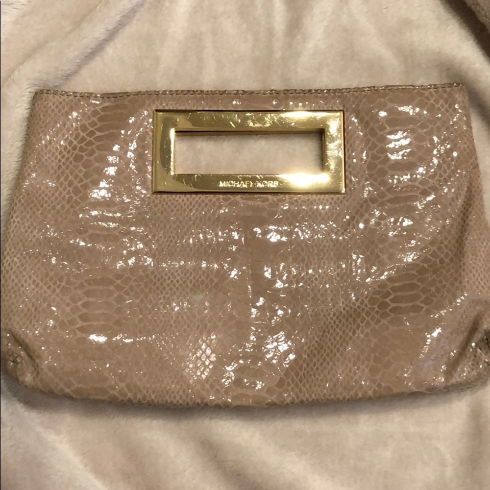 USED Michael Kors beige/blush color clutch